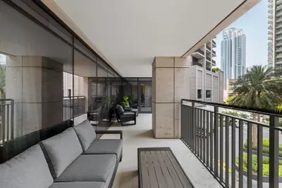 a balcony of a building with a couch at 2BR apartment in downtown Dubai, near Burj Khalifa in Dubai