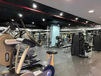 a gym with several treadmills and exercise bikes at Exquisite 1BR Hidden Gem - Oceana Residences in Dubai