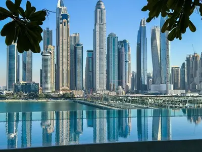a view of a city skyline with a body of water at Vibrant 1BR Apartment with Marina & Ocean View in Dubai