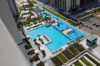 an overhead view of a pool at a hotel at Burj Khalifa View & Dubai Mall Connection in Dubai