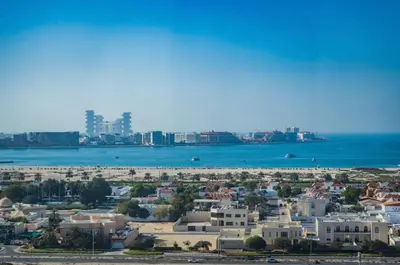an aerial view of a city and the ocean at Specious cosy bedroom in Al Sufouh in Dubai