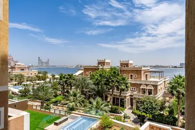 an aerial view of a building with palm trees at Balqis Residences I Spacious and Modern 4BDR I Palm Jumeirah in Dubai