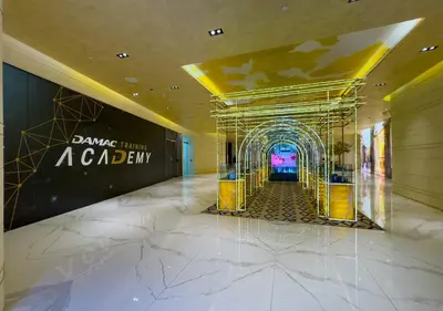 a lobby with an entrance to a luxury building at Savis Homes - Damac Paramount Tower A 1BR Ultimate Luxury and Glam Escape in Dubai