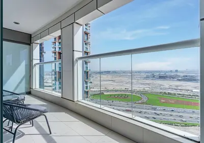 an empty balcony with a view of a city at Savis Homes - Damac Paramount Tower A 1BR Ultimate Luxury and Glam Escape in Dubai