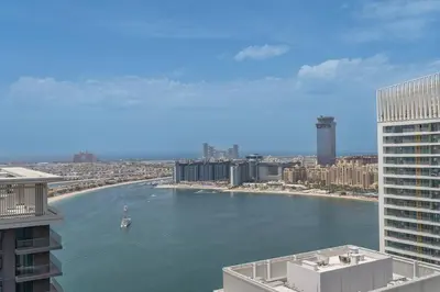 a view of a river in a city with buildings at Czechin * Brand New * BeachFront * Palm View * High Floor in Dubai
