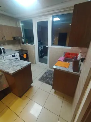a kitchen with a sink and a counter top at luxury master room available in sulafa tower marina in Dubai