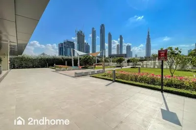 a view of a city skyline with tall buildings at 2ndHome - Downtown Views 1 - Downtown Dubai in Dubai