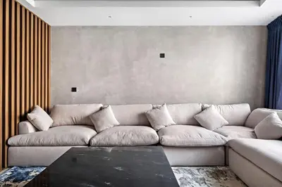 a living room with a couch and a table at Amazing 1br located in the heart of Dubai,JLT in Dubai
