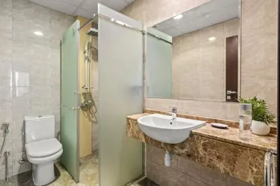 a bathroom with a sink and a toilet at GuestReady - Luxury haven in JLT in Dubai
