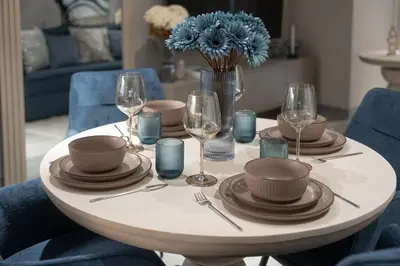 a table with plates and wine glasses on it at Clever Guest 021 Condor Marina Star in Dubai
