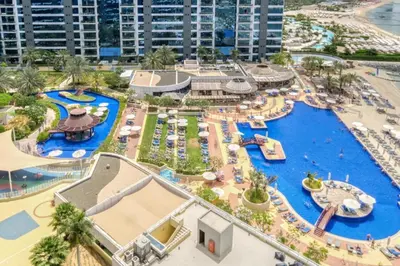 an aerial view of a water park at a resort at Oceana Luxury 4 BR Apartment with Resort Access and Sea Views by Exclusive Holiday Homes in Dubai
