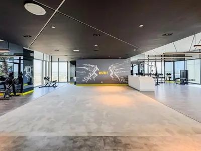 a gym with treadmills and ellipticals in a building at 35th Floor Luxury 2 BR with Stunning Views in Dubai