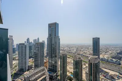 an aerial view of a city with tall buildings at GuestReady - Glamorous place near Burj Khalifa in Dubai
