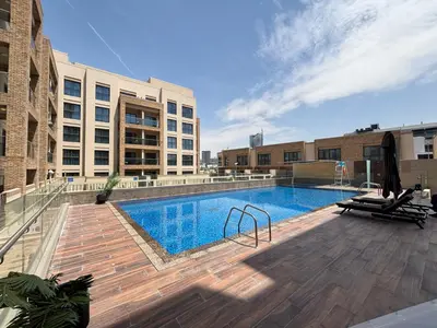 a large swimming pool in the middle of a building at Frank Porter - Eleganz by Danube in Dubai