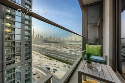 a balcony with a view of a city at Sobha Creek Vistas, Sobha Hartland, MBR City, Dubai in Dubai