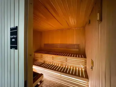 a sauna with a bench in a building at Highest infinity Pool in Downtown Dubai in Dubai