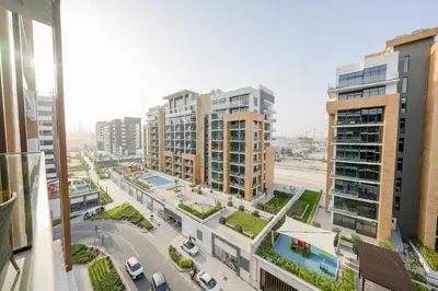 an aerial view of a city with tall buildings at Azizi Riviera 18 in Dubai