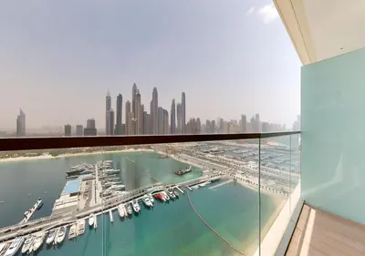 a view of a marina from the window of a building at Waterfront ,High Floor 2BED with Private Beach Access in Dubai