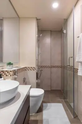a bathroom with a sink and a toilet and a shower at Glamorous 1Bedroom in Business bay l Large Balcony in Dubai