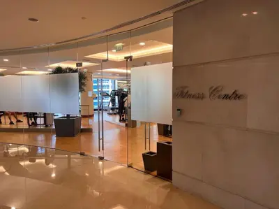 a lobby of a store with a sign on the wall at One bedroom apartment in JW Marriott Hotel Dubai Marina in Dubai