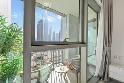 a balcony with a view of a city skyline at Apartment in Downtown Dubai (Burj Khalifa Views) in Dubai