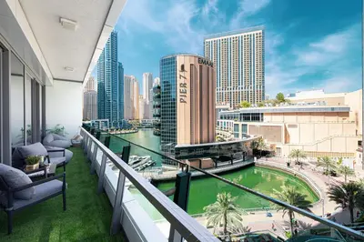 a balcony with a view of the city at Luxe 2-Bedroom In Heart Of Dubai Marina in Dubai