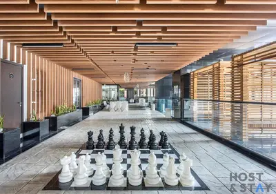 a room with a chess board on the floor at Upgraded Studio in Business Bay in Dubai