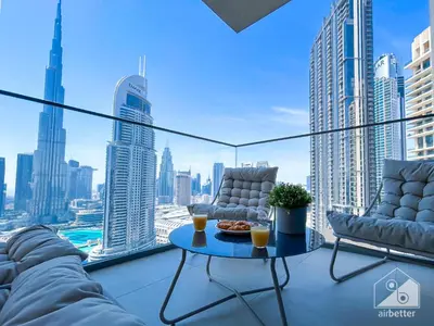 a balcony with a view of a city at Luxurious Living in 2B with Burj & Fountain Views in Dubai