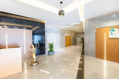 a hallway of an office building with a trophy at Dubai Downtown Dubai Mall & Burj Khalifa DIFC 5 mins in Dubai