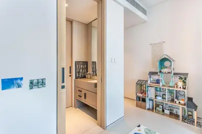 a room with a bathroom with a sink and a mirror at Family Sky Retreat at Address Beach on 56th Floor in Dubai