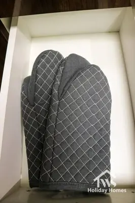 a black blanket in a white box at The Urban Oasis - Harmony in Dubai