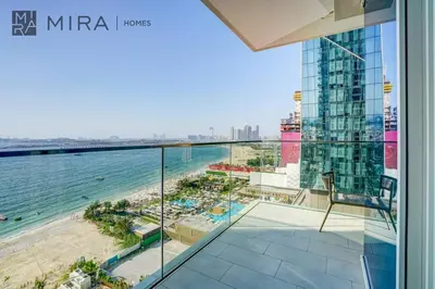 a view of the beach from the balcony of a building at Mira Holiday Homes - Luxury 2 bed apartment in La Vie in Dubai