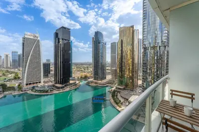 a balcony with a view of a city at Lake Terrace - Vibrant Studio in Dubai