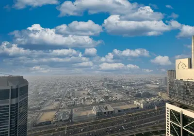 a view of a city from the top of a building at Spectacular views on high floor with Infinity Pool in Dubai