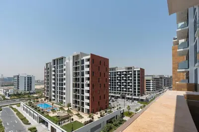 an aerial view of a city with tall buildings at 12 min from downtown - Studio - Azizi Riviera in Dubai