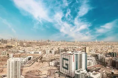 an aerial view of a city with tall buildings at Nice studio in Arjan - Dubai in Dubai