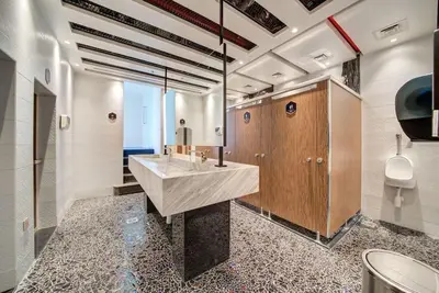 a bathroom with a large sink and a mirror at Comfy Studio in Business Bay l Stays 2 in Dubai