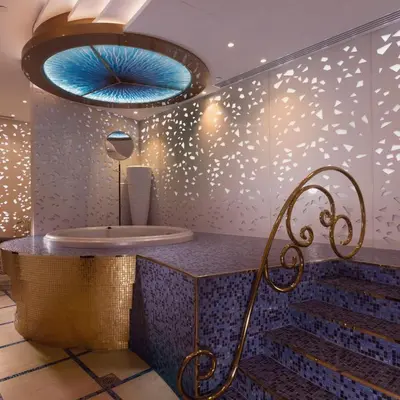 a bathroom with a sink and a blue ceiling at Luxe Sea View High Floor 1 BR in Dubai Marina by Maxx Value Homes in Dubai