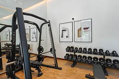 a gym with several rows of exercise bikes at New Listing & Vida Creek Beach & Beach Access in Dubai