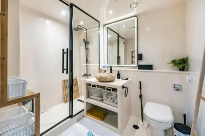 a bathroom with a toilet and a shower at FAM Living - Panoramic Dubai Marina View apartment in Dubai