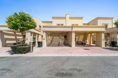 an empty parking lot in front of a building at Stonetree - The Springs 5 - Peaceful Community in Dubai
