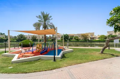 a playground with a slide in a park at Stonetree - The Springs 5 - Peaceful Community in Dubai