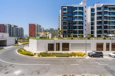 an empty parking lot in a city with tall buildings at GuestReady - Downtown Dubai luxurious living in Dubai