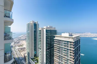 an aerial view of tall buildings next to the ocean at Beachfront 2-BDR, High floor, Sea and Palm View, Beach Access in Dubai