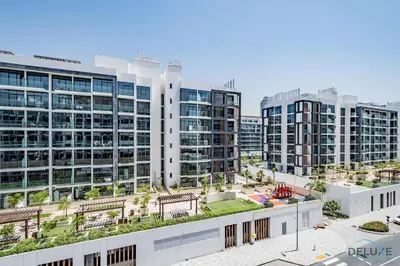 an aerial view of a city with tall buildings at Charming Studio at Azizi Riviera 32, Al Merkadh by Deluxe Holiday Homes in Dubai
