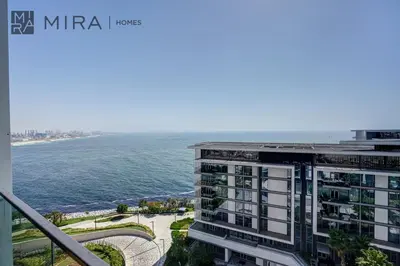 a view of the ocean from the balcony of a building at Mira Holiday Homes - Lovely 3 bedroom in Bluewaters with sea view in Dubai