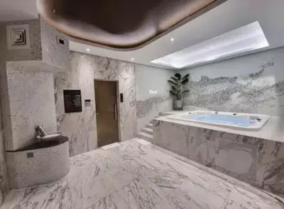 a large bathroom with a tub and a sink at Premium 2 BDR Burj Khalifa Infinity Pool View in Dubai
