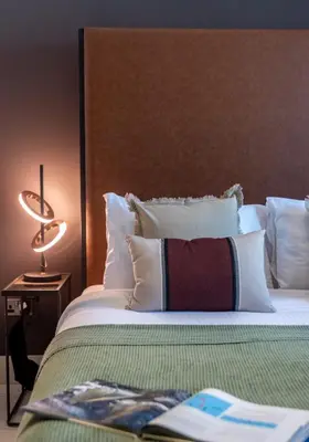 a bedroom with a large bed with white pillows at The Smart Concierge - Reehan 6 in Dubai