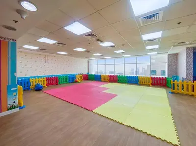 a brightly colored room with a large rug at Bright Downtown Dubai Studio by Mall, Burj Khalifa & Fountains in Dubai