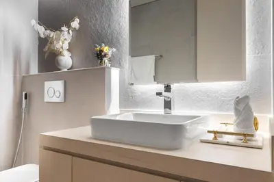 a bathroom with a white sink on a counter at Condor Marina Star, Dubai Marina by SIMPLY COMFORT in Dubai